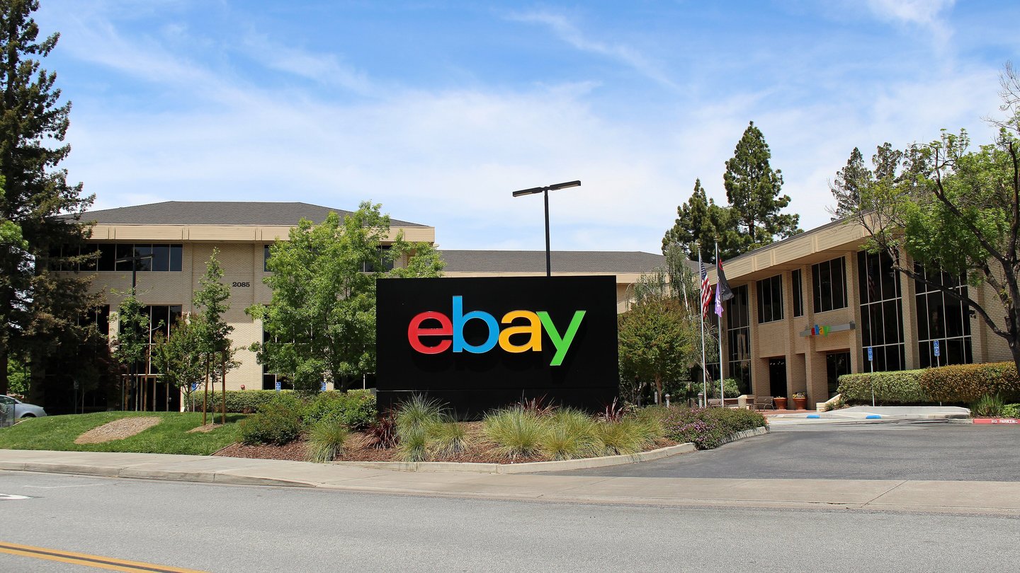 Office buildings at eBay's headquarters campus in San Jose, California, with a large eBay sign in front