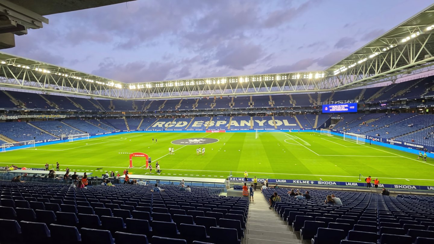 Inside Espanyol's RCDE Stadium in Cornellà, with the pitch, stands and roof lit up