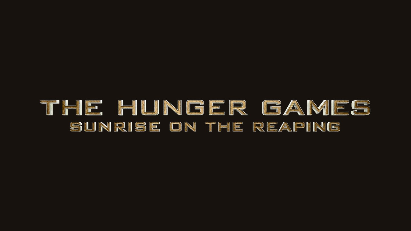 The gold metallic title logo of The Hunger Games: Sunrise on the Reaping on a dark background