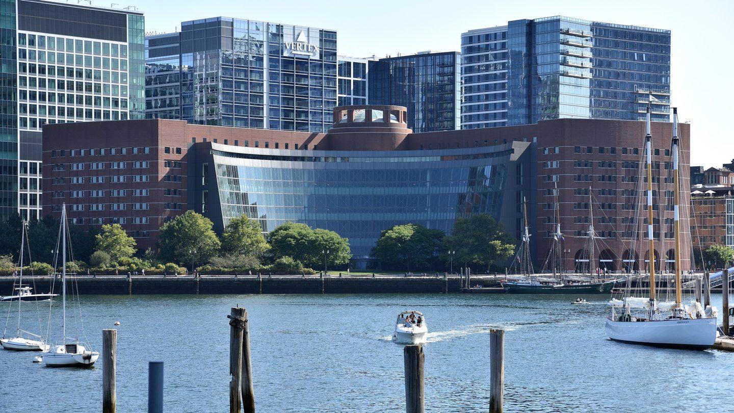 The John Joseph Moakley United States Courthouse in Boston seen across the water from the harbour