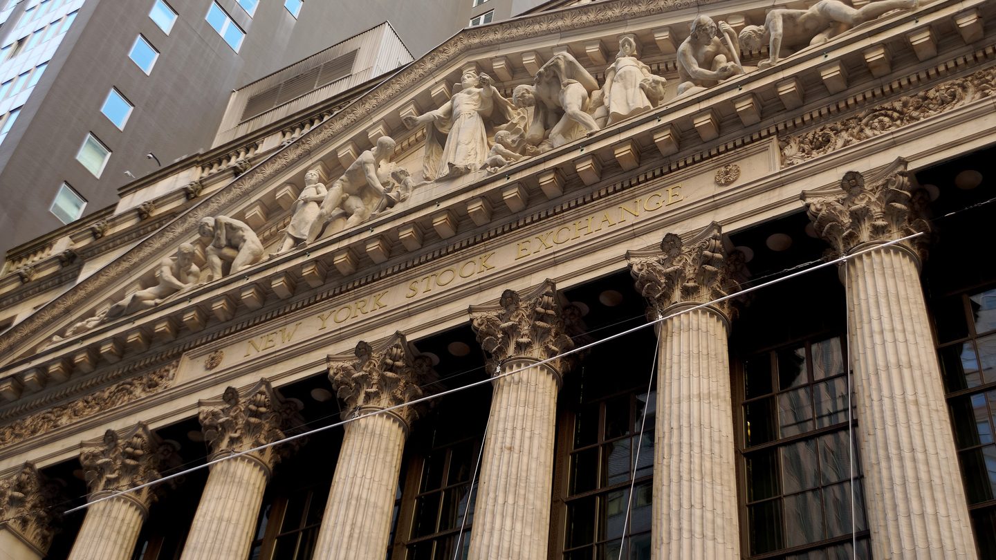 The columns and carved pediment of the New York Stock Exchange building on Broad Street